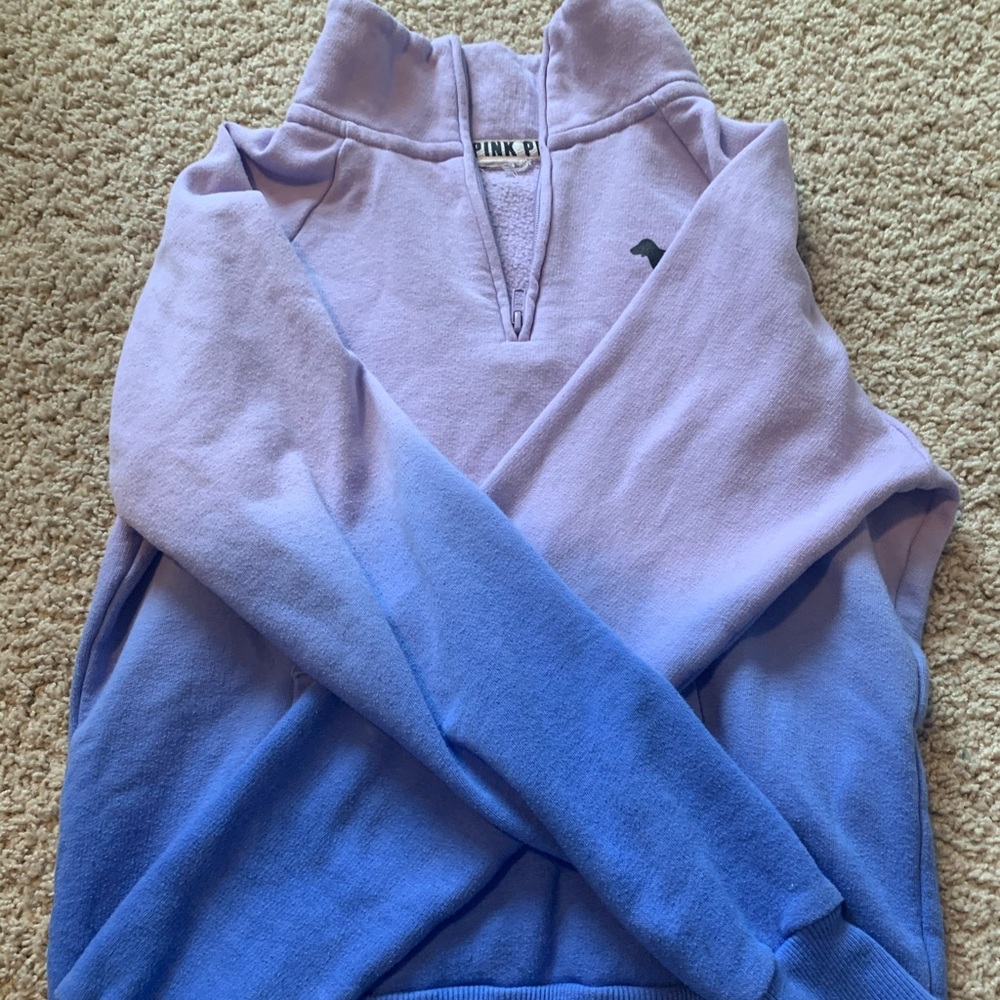 PINK quarter zip sweatshirt.
